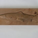 Top Layer - a carved trout